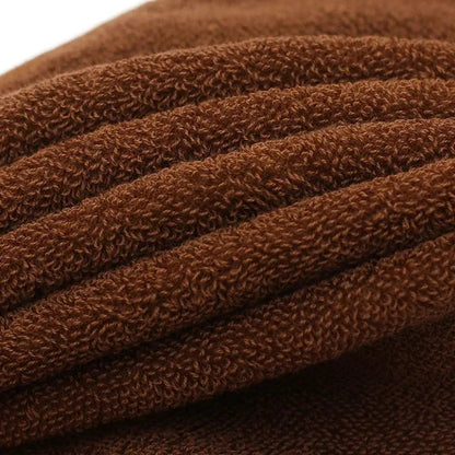 Santorini katoenen handdoek zachte badstof close-up in bruin – Elyssor Fashion